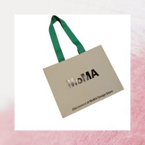 Free with purchase* | Museum of Metropolitan Arts paper shopping or gift bag
